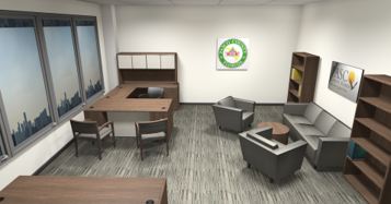 Open office with an L-shaped desk near windows, a small meeting table with chairs, and a gray sofa seating area; logo sign on the wall.